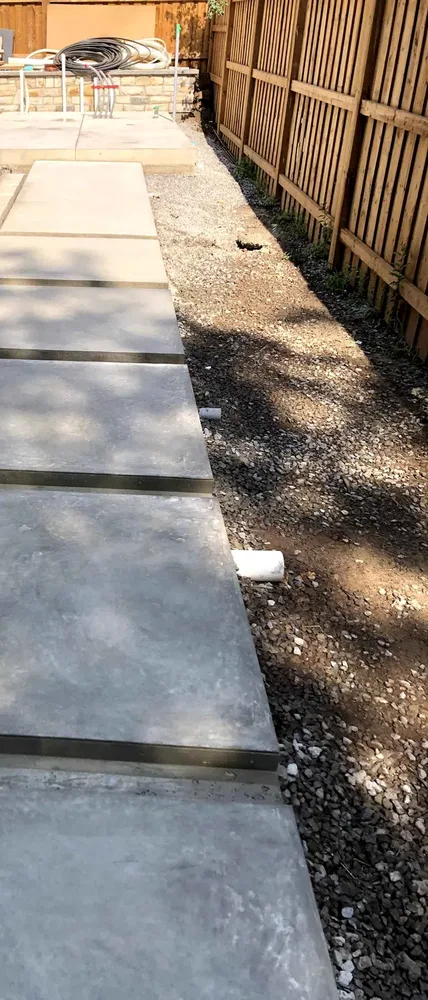 Wood fence installation and backyard boundary work by KRT Construction