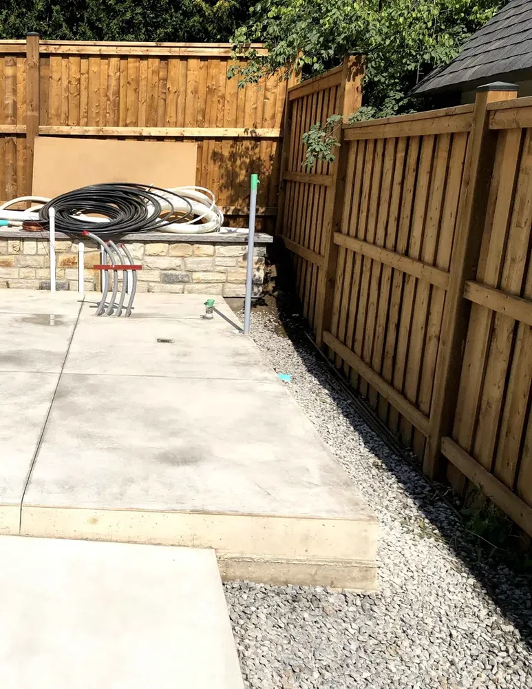 Backyard fence and exterior work by KRT Construction